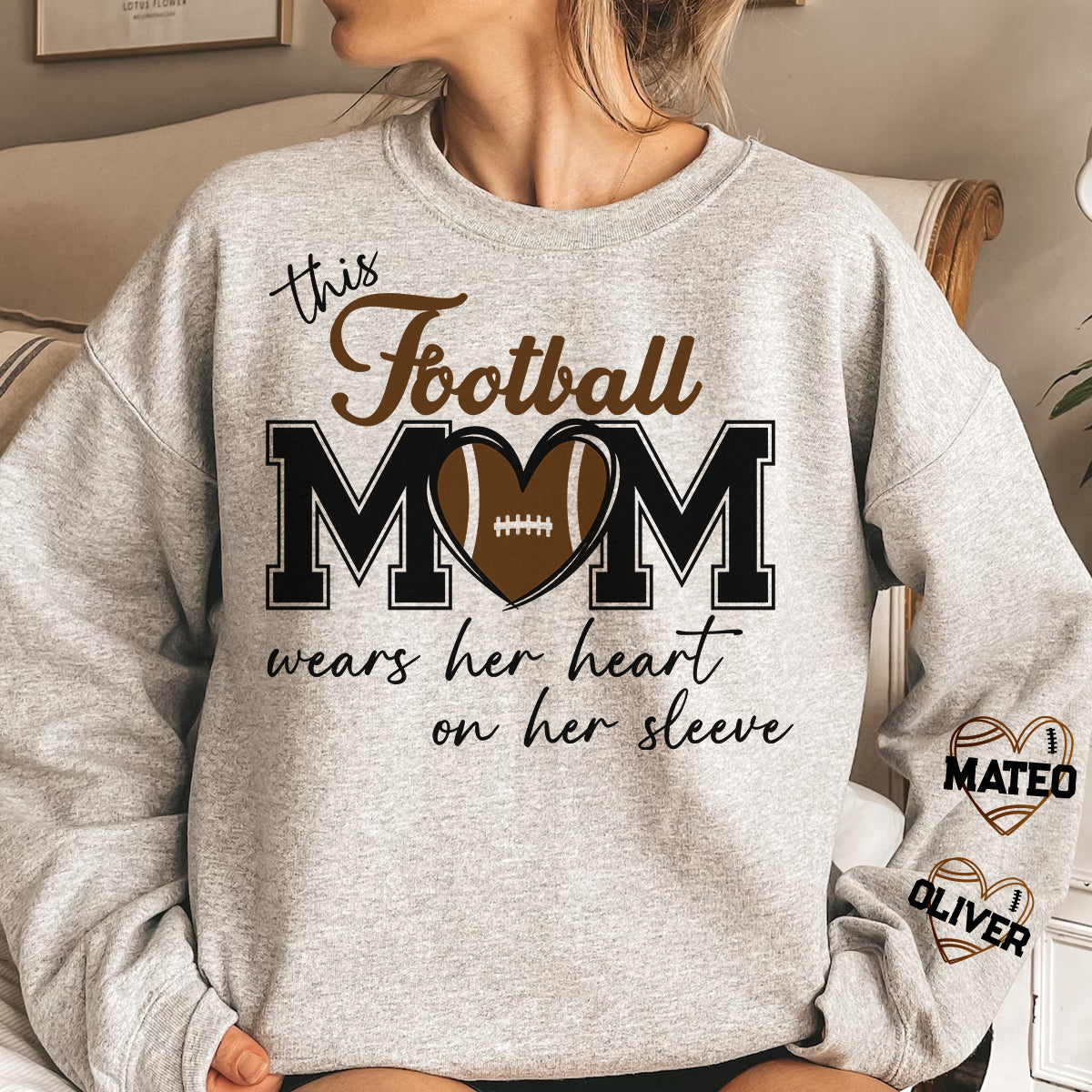 This Football Mom Wears Her Heart On Her Sleeve - Personalized Sweatshirt