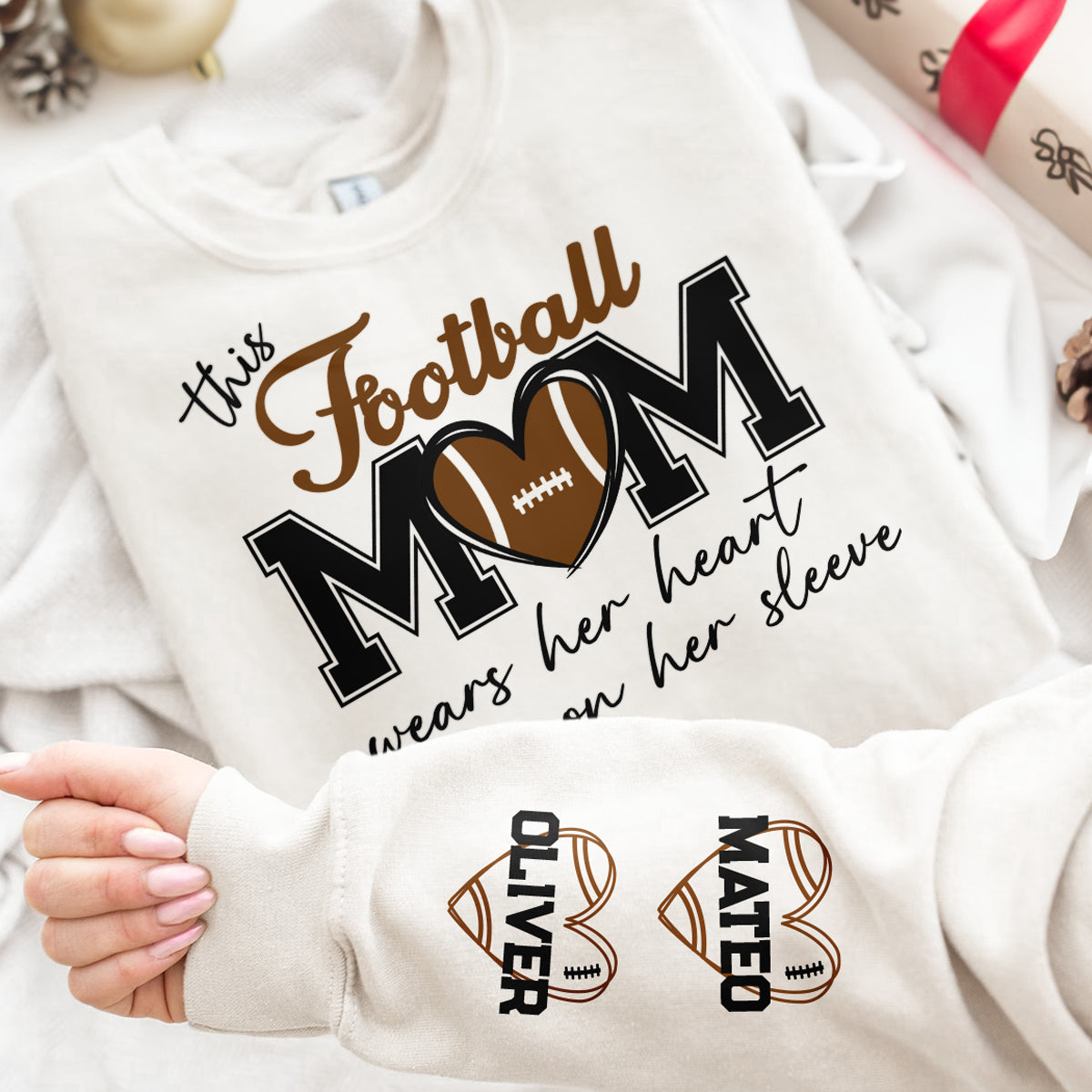 This Football Mom Wears Her Heart On Her Sleeve - Personalized Sweatshirt