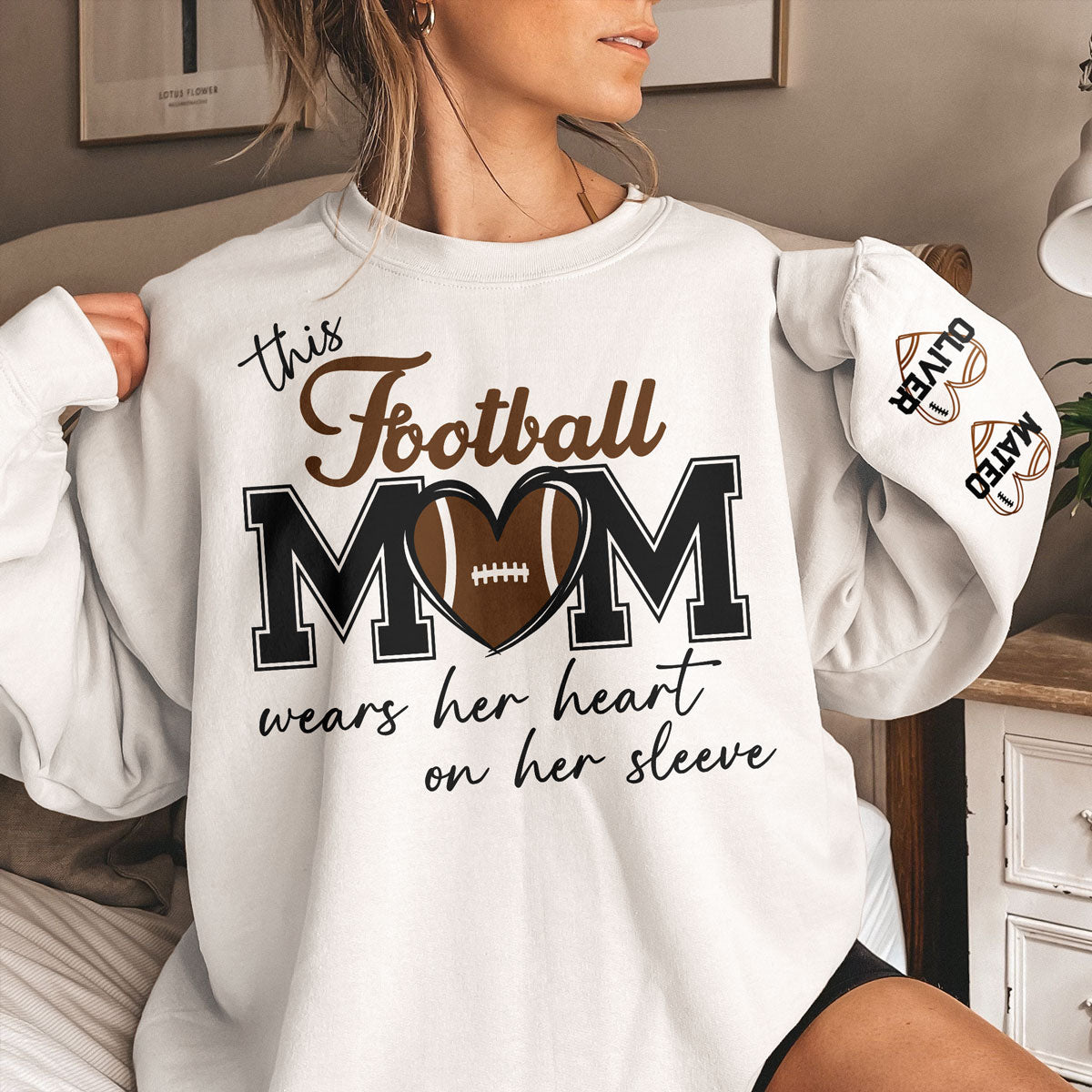 This Football Mom Wears Her Heart On Her Sleeve - Personalized Sweatshirt